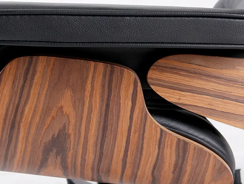 Charles Eames lounge chair and ottoman in rosewood Brown
