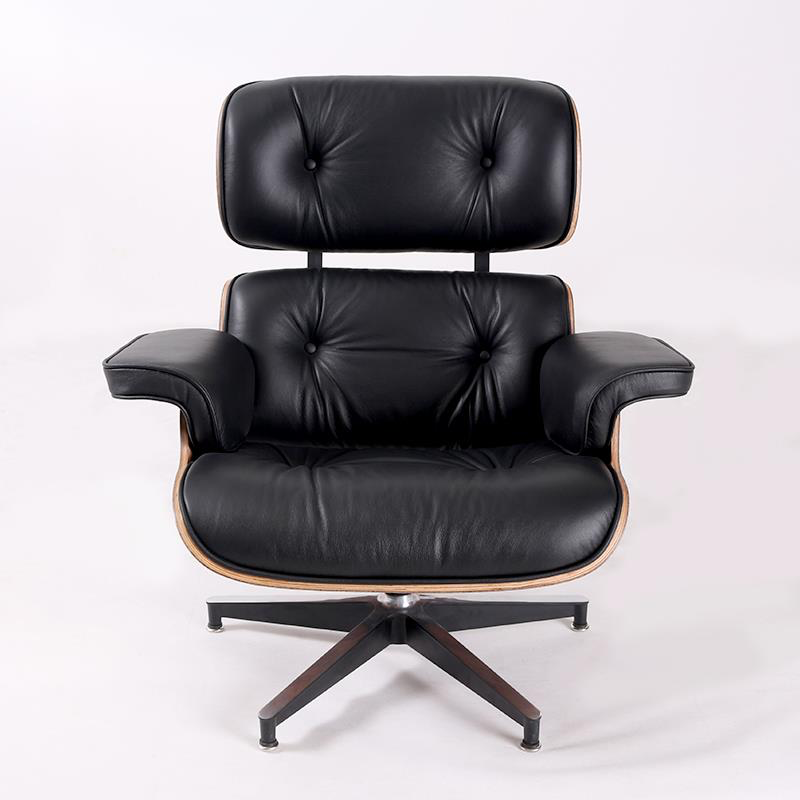 Charles Eames lounge chair and ottoman in rosewood Brown
