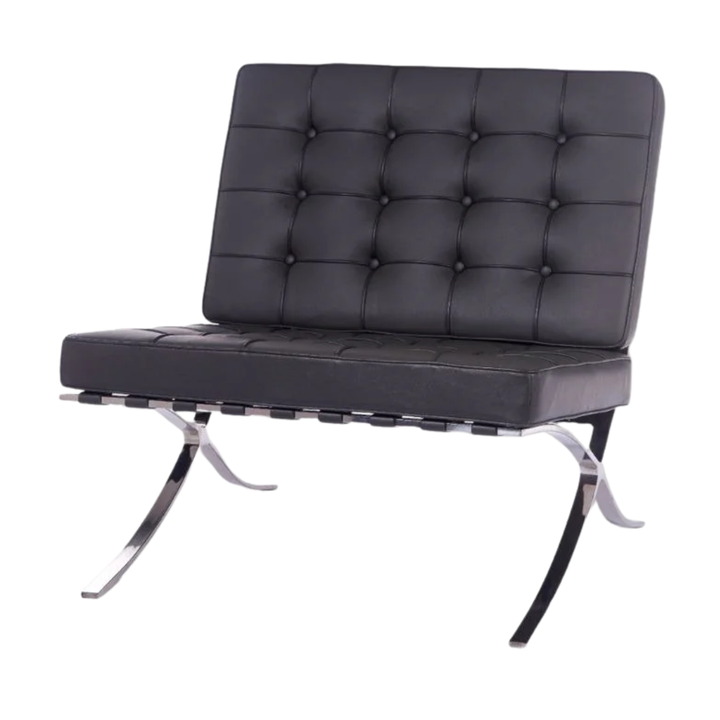 Black leather chair with chrome legs on a white background