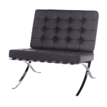 Black leather chair with chrome legs on a white background